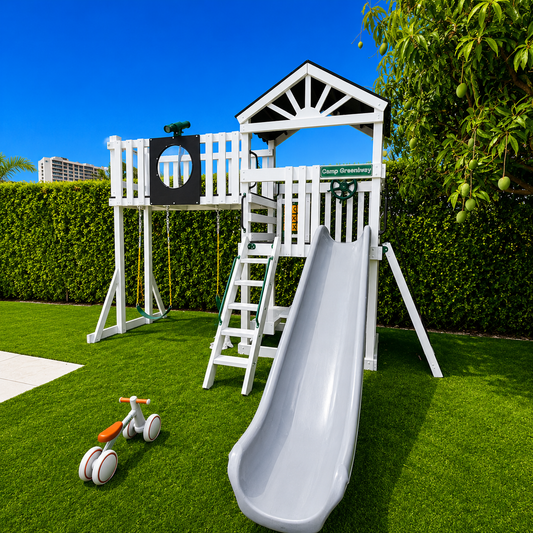 white vinyl swing set with black roof, slide swings and bridge.