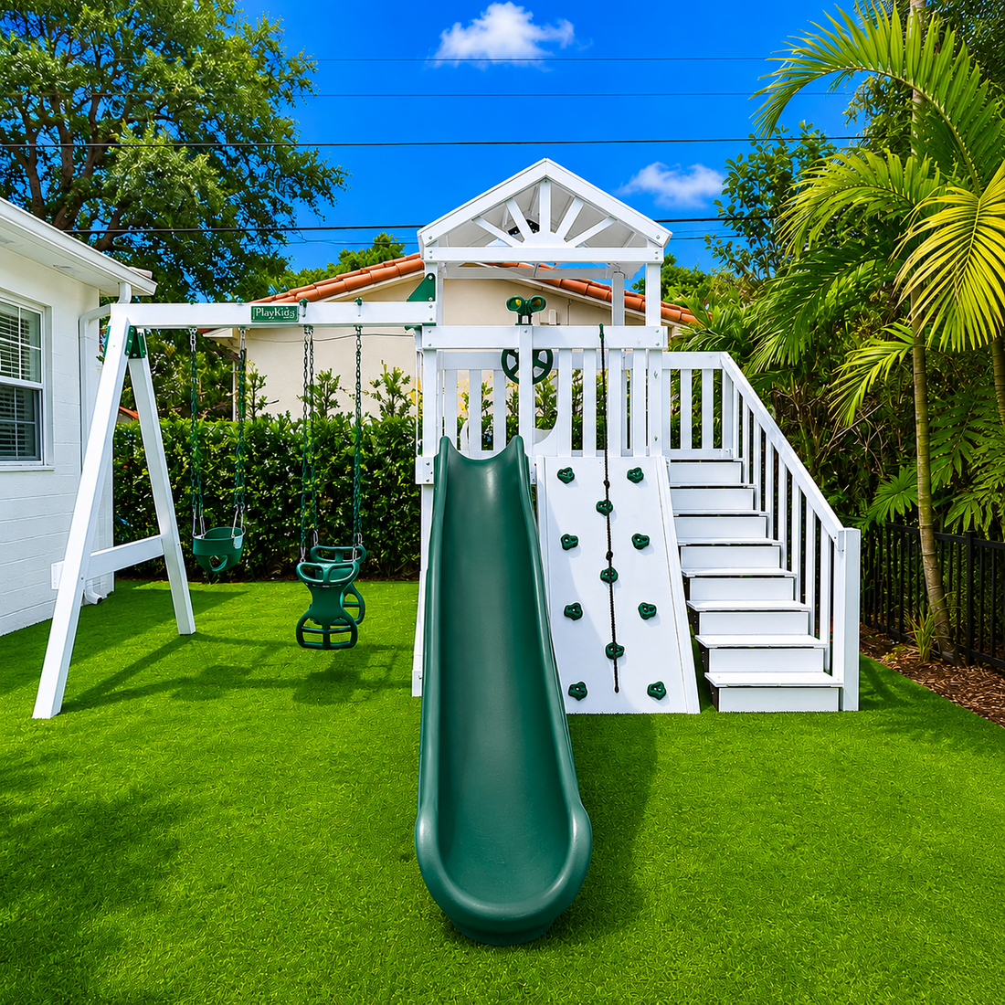 white vinyl swing set with roof, slide, swings and staircase