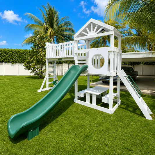white vinyl swing set with roof, slide, swings and picnic table
