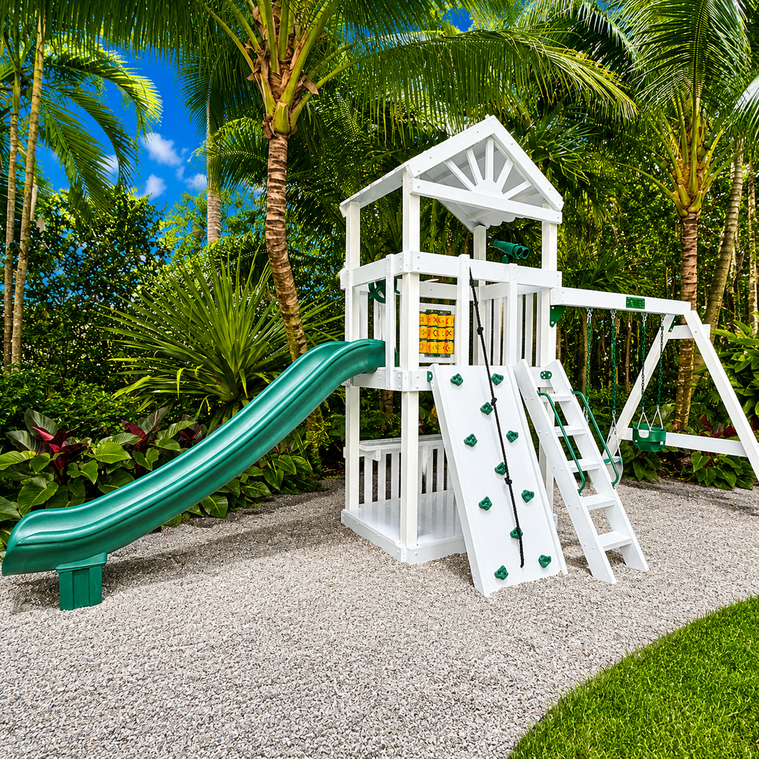 white vinyl swing set with roof, slide, swings and rock wall