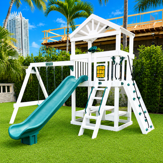 white vinyl swing set with roof, slide, swings and rock wall